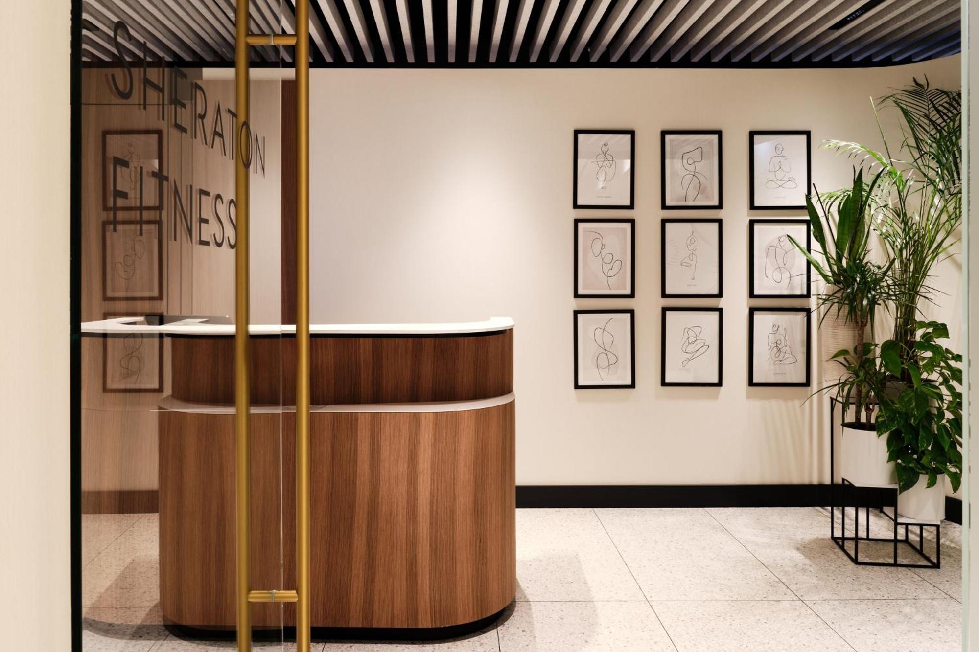 Sheraton Grand Warsaw Exterior photo Entrance to the business lounge at the airport
